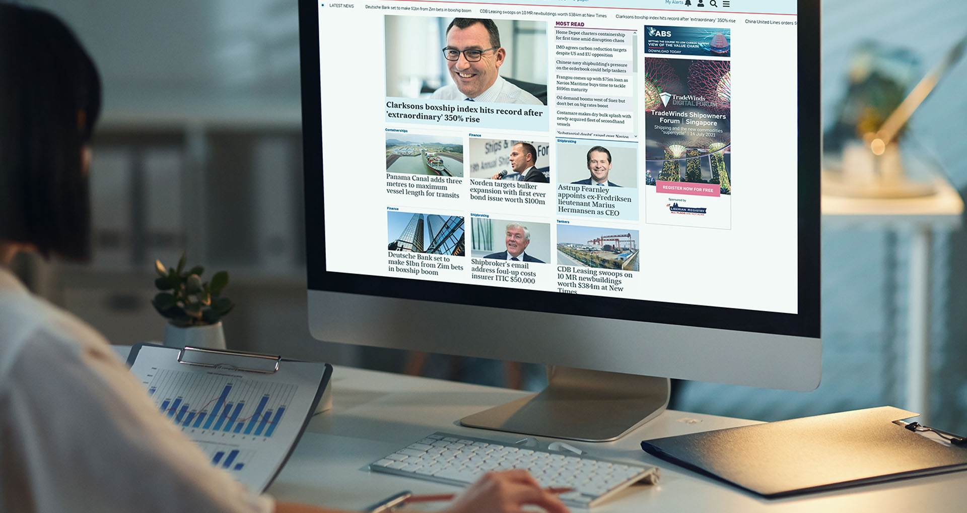 businesswoman-analyzing-financial-TW